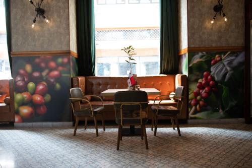 Coin salon dans l'établissement La Concordia - Boutique Hotel