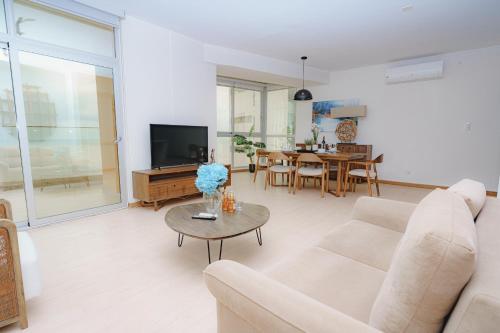 Телевизор и/или развлекательный центр в Boutique Apartments Panamá Coco del Mar