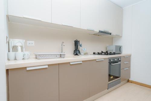 Кухня или мини-кухня в Boutique Apartments Panamá Coco del Mar
