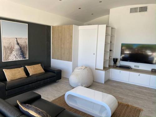 Χώρος καθιστικού στο Magnifique maison les pieds dans l eau