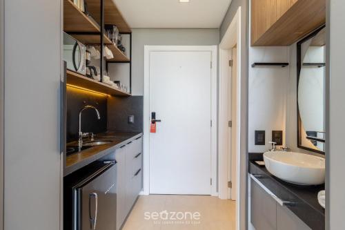 Una cocina o zona de cocina en Spot Jurere sofisticación junto al mar - SPJ's