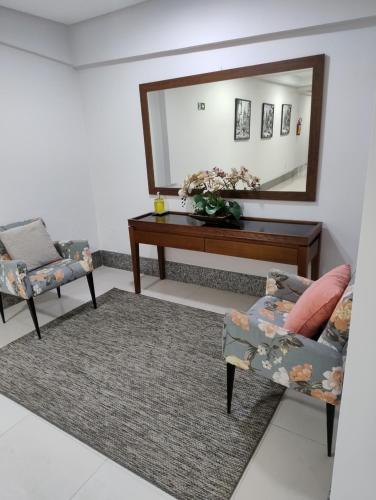 Χώρος καθιστικού στο Apartamento em Capão, no centro!