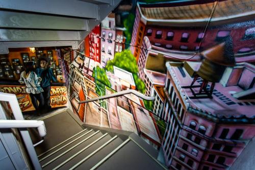 a view of a building with paintings on the wall at citizenM New York Bowery in New York