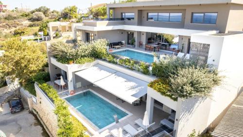 Seafront villas I "Free" Heated pools & 100m to Sea