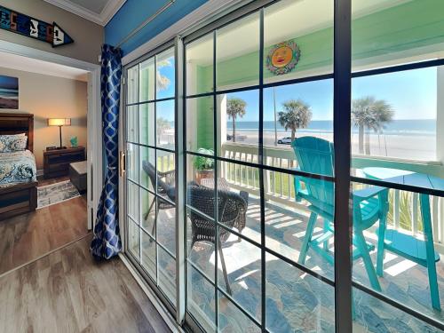 a room with a view of the ocean from the balcony at Dawn 223- Buena Vista in Galveston