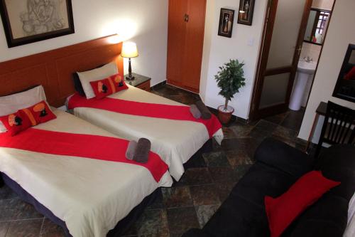 Postel nebo postele na pokoji v ubytování Shonalanga Lodge