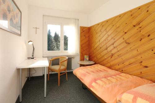 Voodi või voodid majutusasutuse Allegro Alpin Lodge toas