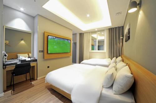 Seosan Hound Hotelにあるテレビまたはエンターテインメントセンター