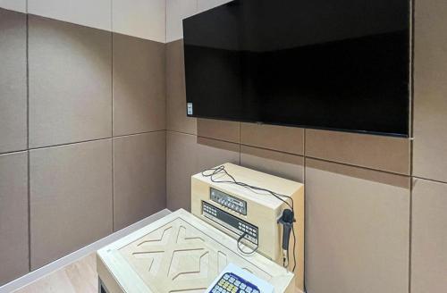 Seosan Hound Hotelにあるテレビまたはエンターテインメントセンター