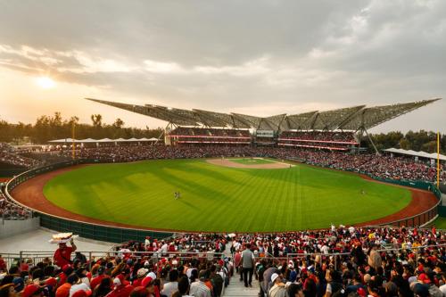 a large crowd of people at a baseball game at Exclusivas Habitaciones al Oriente in Mexico City