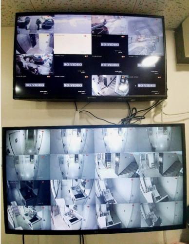 a flat screen tv sitting on top of a wall at king's house in Gwangju
