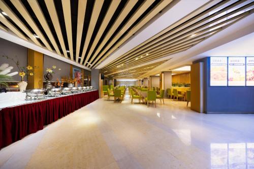 Restaurace v ubytování Holiday Inn Express Zhengzhou Airport by IHG