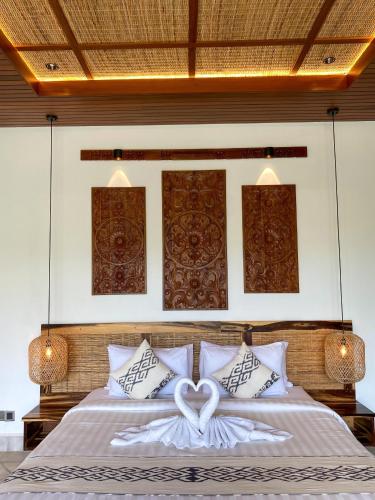 Letto o letti in una camera di Abian Ayu Villa