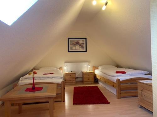 Ένα ή περισσότερα κρεβάτια σε δωμάτιο στο Strandliebe