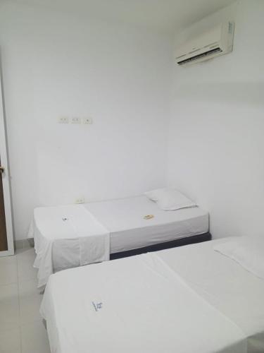 Katil atau katil-katil dalam bilik di Condominio de Cabañas Cangrejo Azul