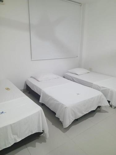 Katil atau katil-katil dalam bilik di Condominio de Cabañas Cangrejo Azul