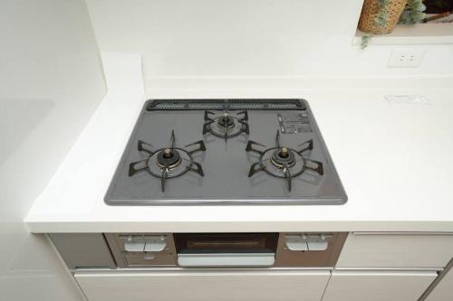 Dapur atau dapur kecil di 一軒家貸切 Royal Leaf Makuhari 幕張メッセまで車で5分 ディズニーが近い