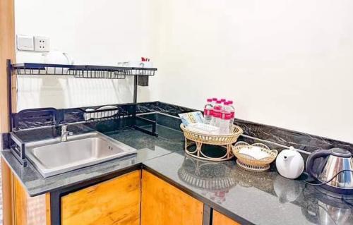 Kuchyň nebo kuchyňský kout v ubytování Seahorse Resort