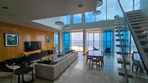 a living room with a couch and a table at Reflections Tower Two in Gold Coast