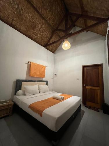 Katil atau katil-katil dalam bilik di Rizky homestay