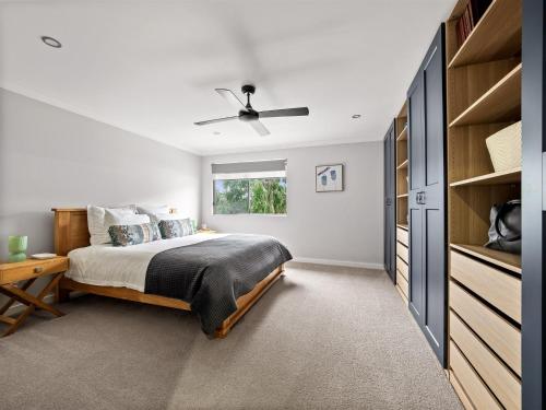 a bedroom with a bed and a window at Reubs - Margaret River in Margaret River Town