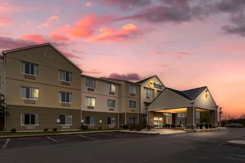 a rendering of a hotel at dusk at Comfort Inn & Suites in Corbin