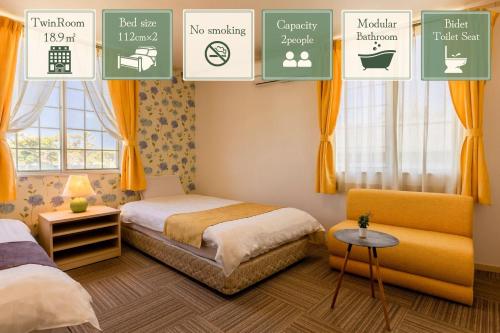a bedroom with two beds and orange curtains at Goto Conkana Kingdom in Goto