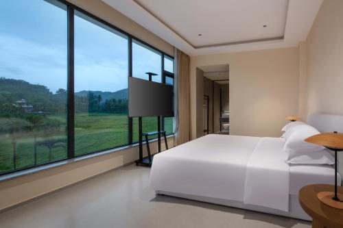 Fotografie z fotogalerie ubytování Star Paddy Fields Resort v destinaci Lingshui
