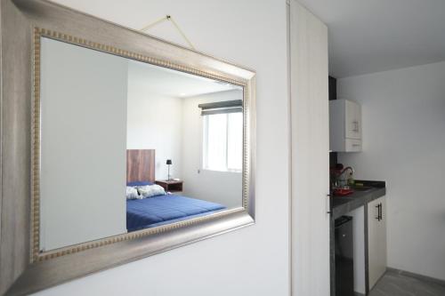 Ένα ή περισσότερα κρεβάτια σε δωμάτιο στο Lofts Arsénico