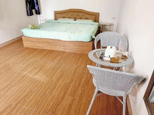 Voodi või voodid majutusasutuse Seamthong Resort เสียมทองรีสอร์ท toas