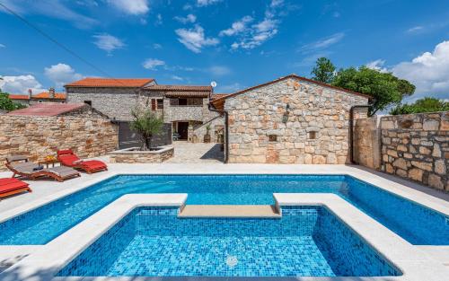 Villa Casa di Roccia for 8 people near Pula - pet friendly with heated pool & jacuzzi
