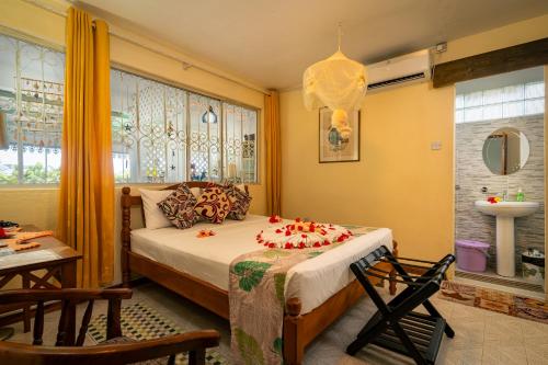 Ένα ή περισσότερα κρεβάτια σε δωμάτιο στο Lemongrass Lodge