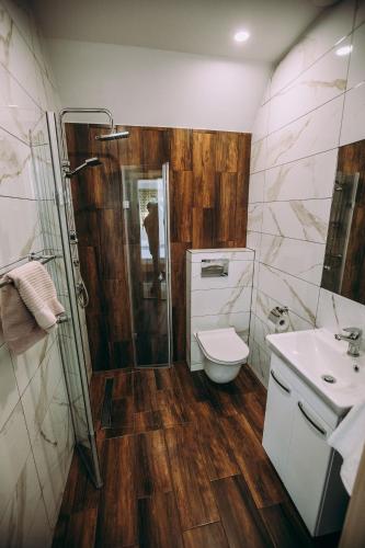 Koupelna v ubytování Apartamenty Aleksandra