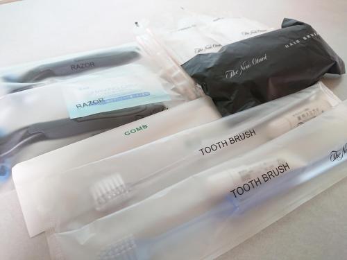 a plastic container with two pairs of scissors in it at Hotel New Otani Saga in Saga