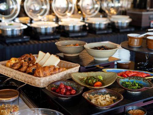 a buffet with many different types of food on a table at Hotel New Otani Saga in Saga