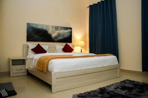 Postel nebo postele na pokoji v ubytování THAAL Rooms Sharjah