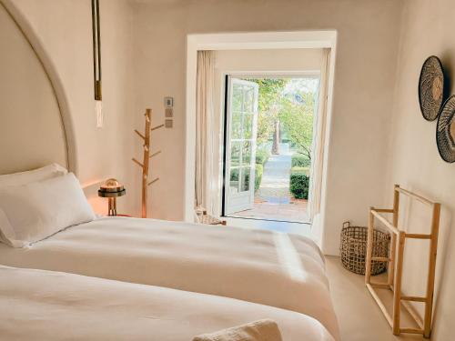 Ένα ή περισσότερα κρεβάτια σε δωμάτιο στο Viluz - Wellbeing Resort Marbella