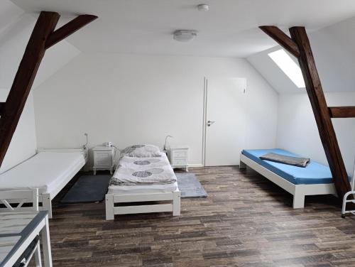 Katil atau katil-katil dalam bilik di Ferien- Monteurwohnung bis 6 Personen