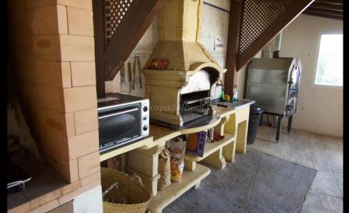 Kuchyň nebo kuchyňský kout v ubytování Casa La Vera
