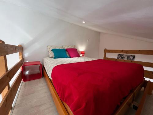 En eller flere senge i et værelse på LOFT des 7 chemins - 4 Voyageurs