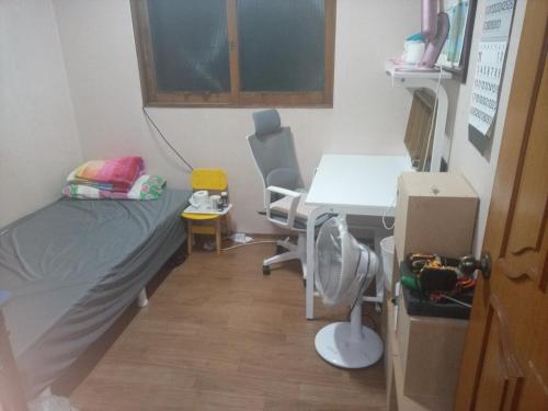 Katil atau katil-katil dalam bilik di Ocean House - Pyeongtaek 2
