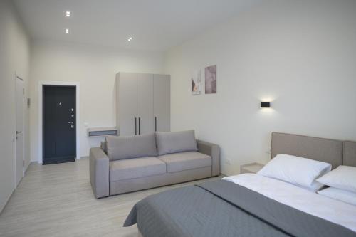 Postel nebo postele na pokoji v ubytování REST INN apart hotel