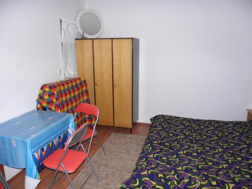 Postel nebo postele na pokoji v ubytování Apartments Kuce