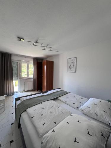 a bedroom with two beds in a room at Apartments Matanovic in Krapinske Toplice