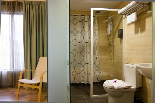 Koupelna v ubytování Alami Garden Hotel