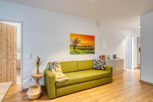 Posezení v ubytování COOEE alpin Hotel Dachstein