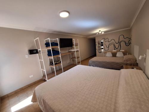 Katil atau katil-katil dalam bilik di Apart Hotel Marilian