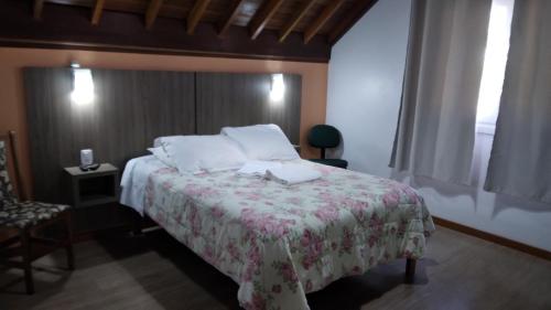 Postel nebo postele na pokoji v ubytování Pousada Genial