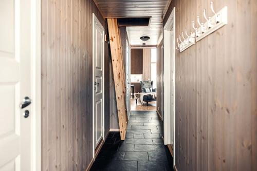 a hallway leading to a room with at Harevadet 211 in Hornindal