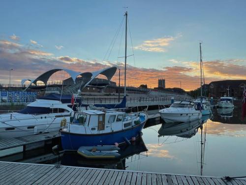 a group of boats docked in a marina at Holiday Inn Hull Marina by IHG in Hull